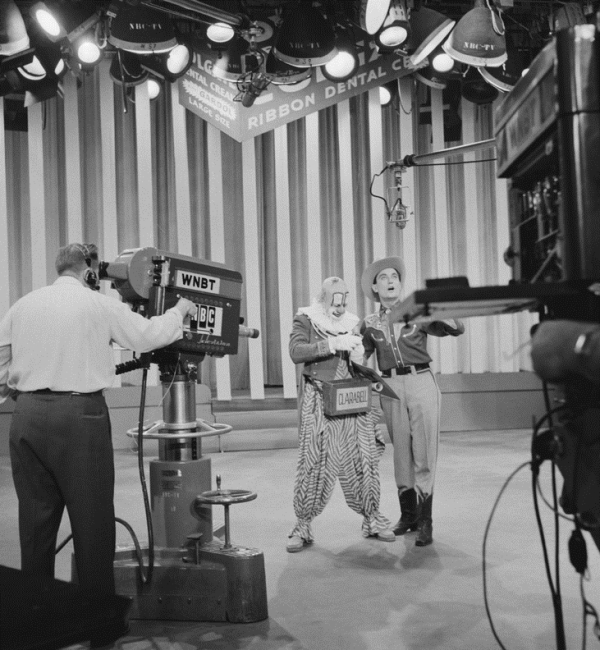 HOWDY DOODY -- Pictured: (l-r) Lew Anderson as Clarabell the Clown, Bob Smith as host Buffalo Bob Smith during taping of the Colgate 5th Anniversary party -- Photo by: NBCU Photo Bank