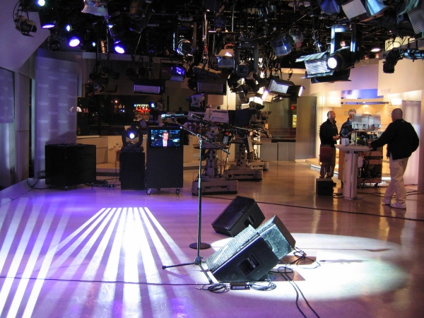 Studio 1A is located across the street from the GE Building at 10 Rockefeller Plaza. Shown here is the "Production" area, set up for a live performance. In the background is the "Homebase" area of the set, while to the right is the "Interview" area.